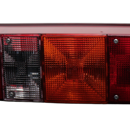 Hella Feu arrière de remorque - Hella - 4 chambres - droite - 246x108x66 mm - raccordement par cosse plate - avec feu de recul